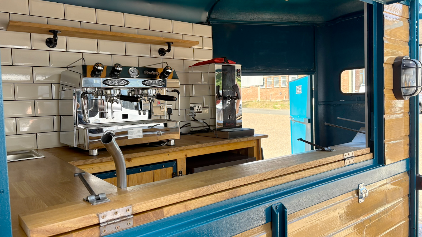 Coffee machine installed inside a converted vehicle