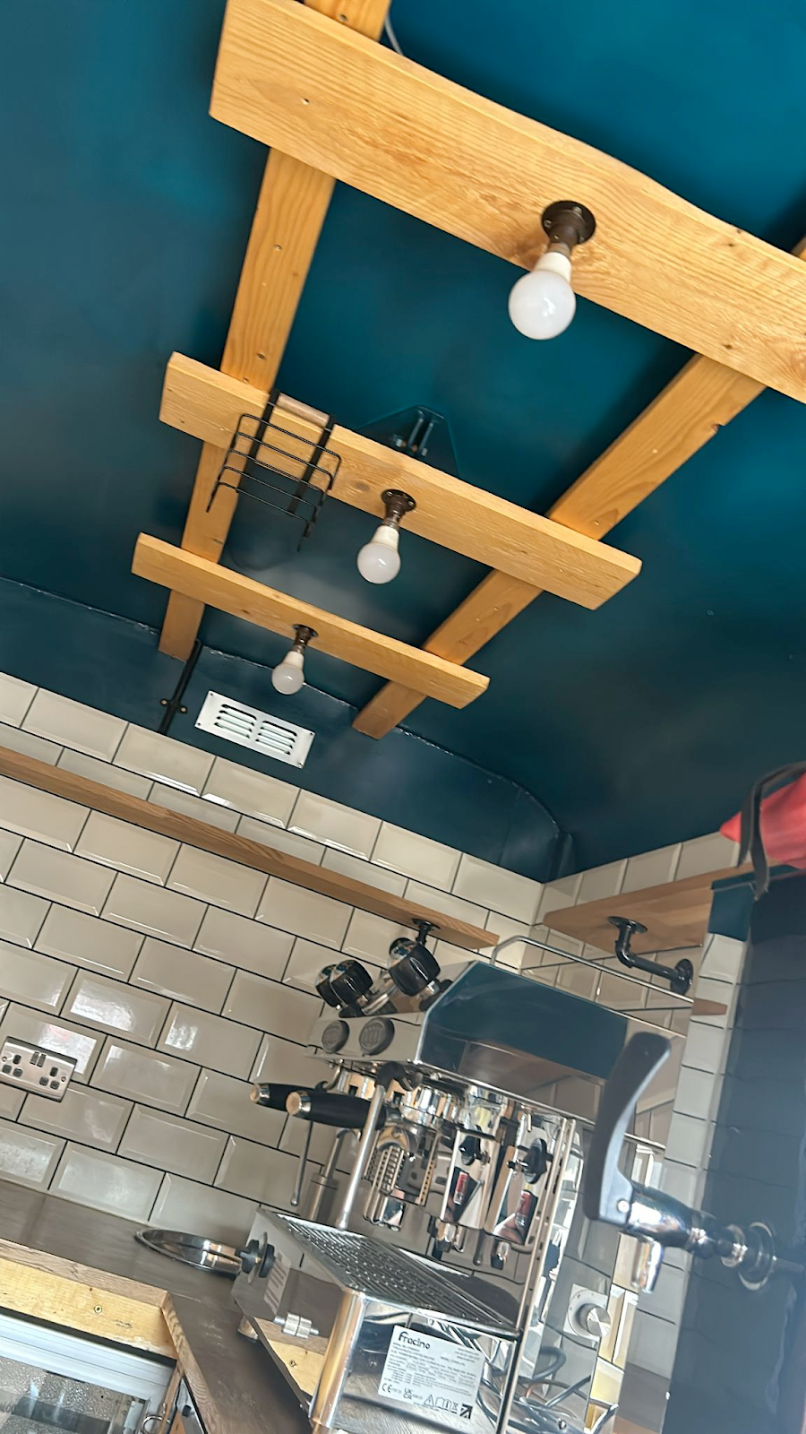 Interior with wooden ceiling and integrated power systems